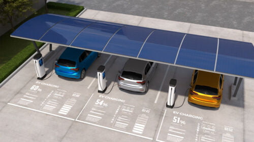 Wszystkie wiadomości - electric cars are being charged vehicle parking with solar panel energy