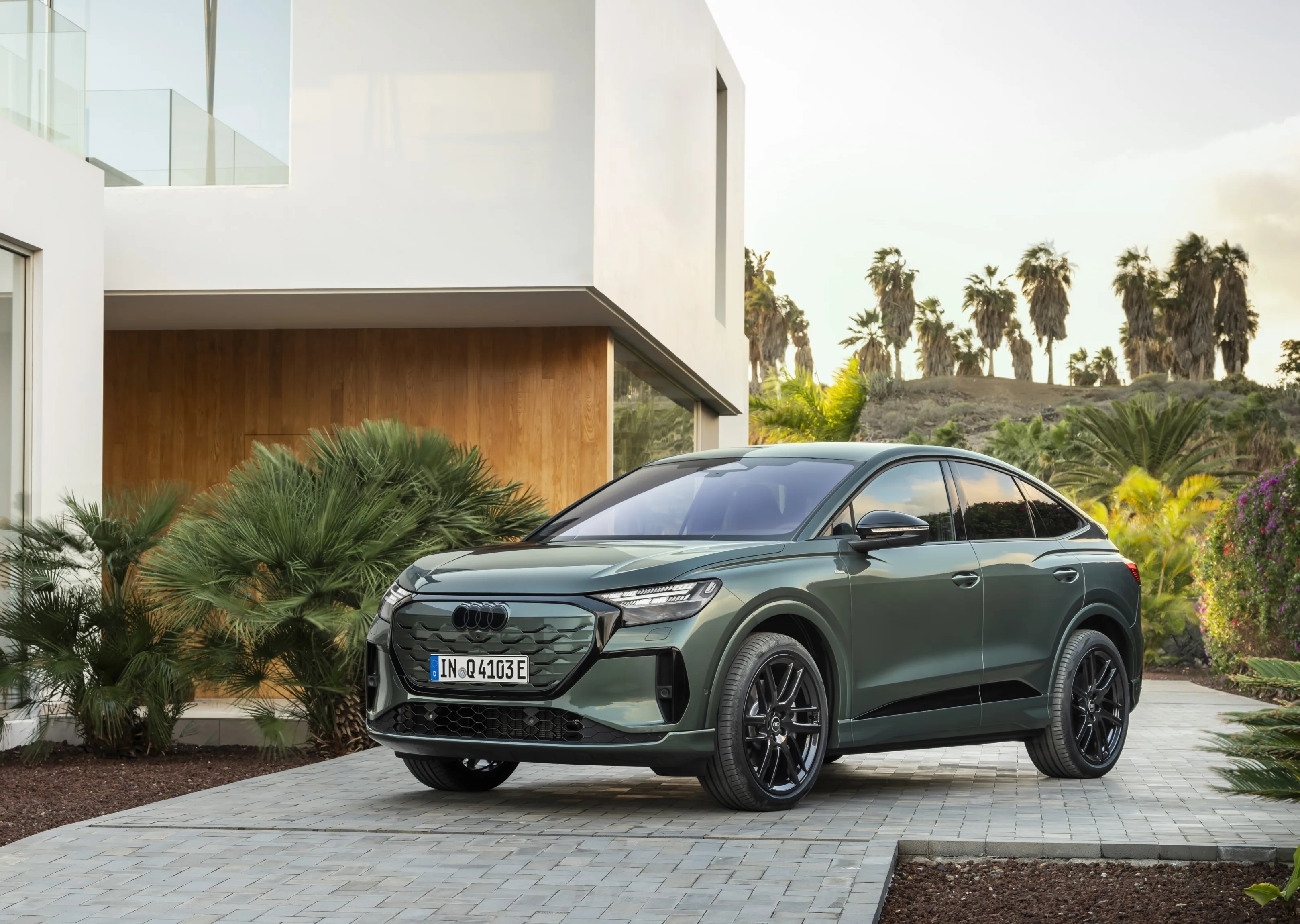Sage green metallic, outdoor static photo, exterior, three-quarter front view