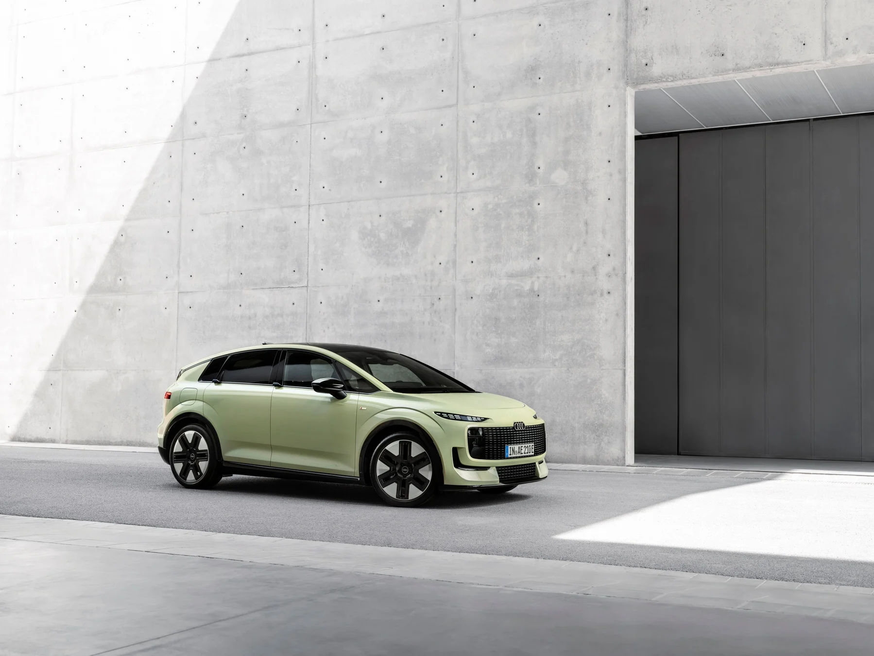 Colour: pistachio green, outdoor static photo, exterior, three-quarter front view