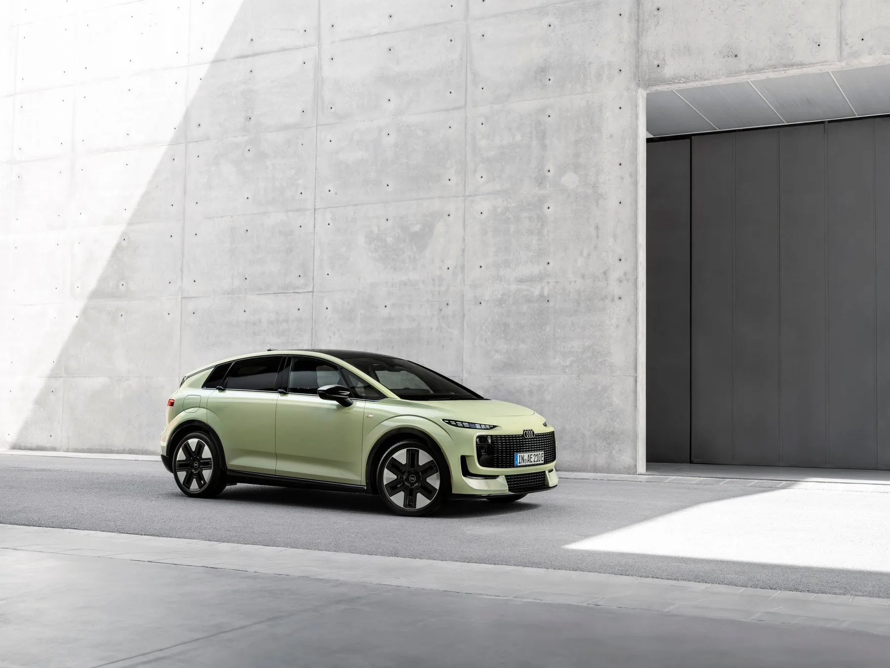 Colour: pistachio green, outdoor static photo, exterior, three-quarter front view